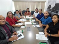 Adrianna Ramos preside a primeira reunião da Comissão Internacional.